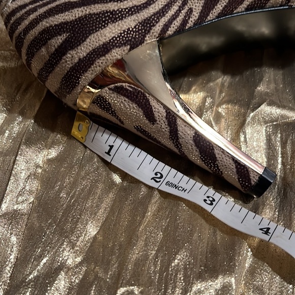 Animal print, brown, cream, gold fabric has a sueded finish - Picture 7 of 7